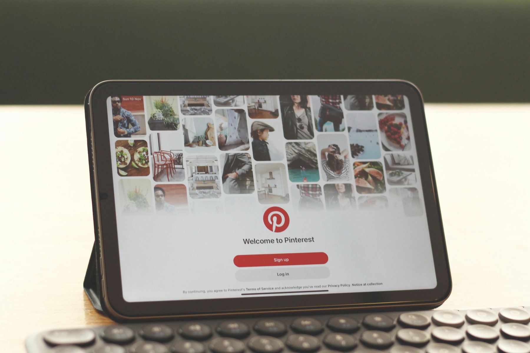 Tablet displaying Pinterest's welcome screen, while the second image includes text about flagged pins on Pinterest and their potential impact on visibility